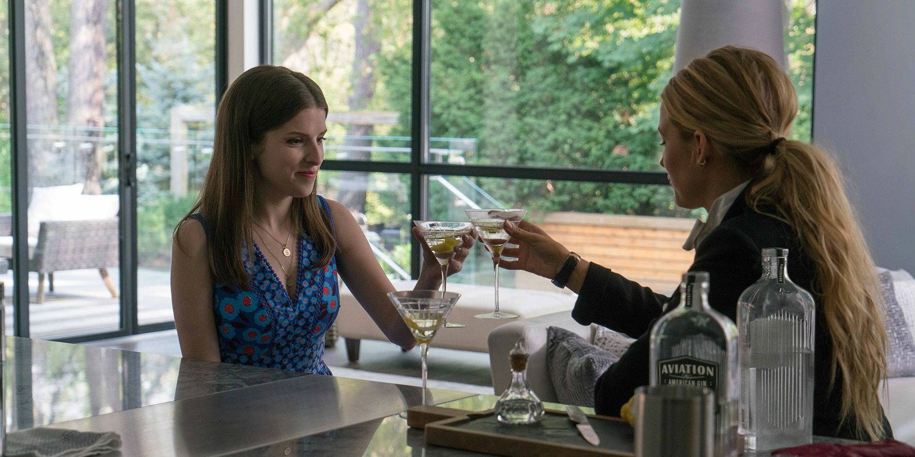 Anna Kendrick and Blake Lively toast martinis in A Simple Favor