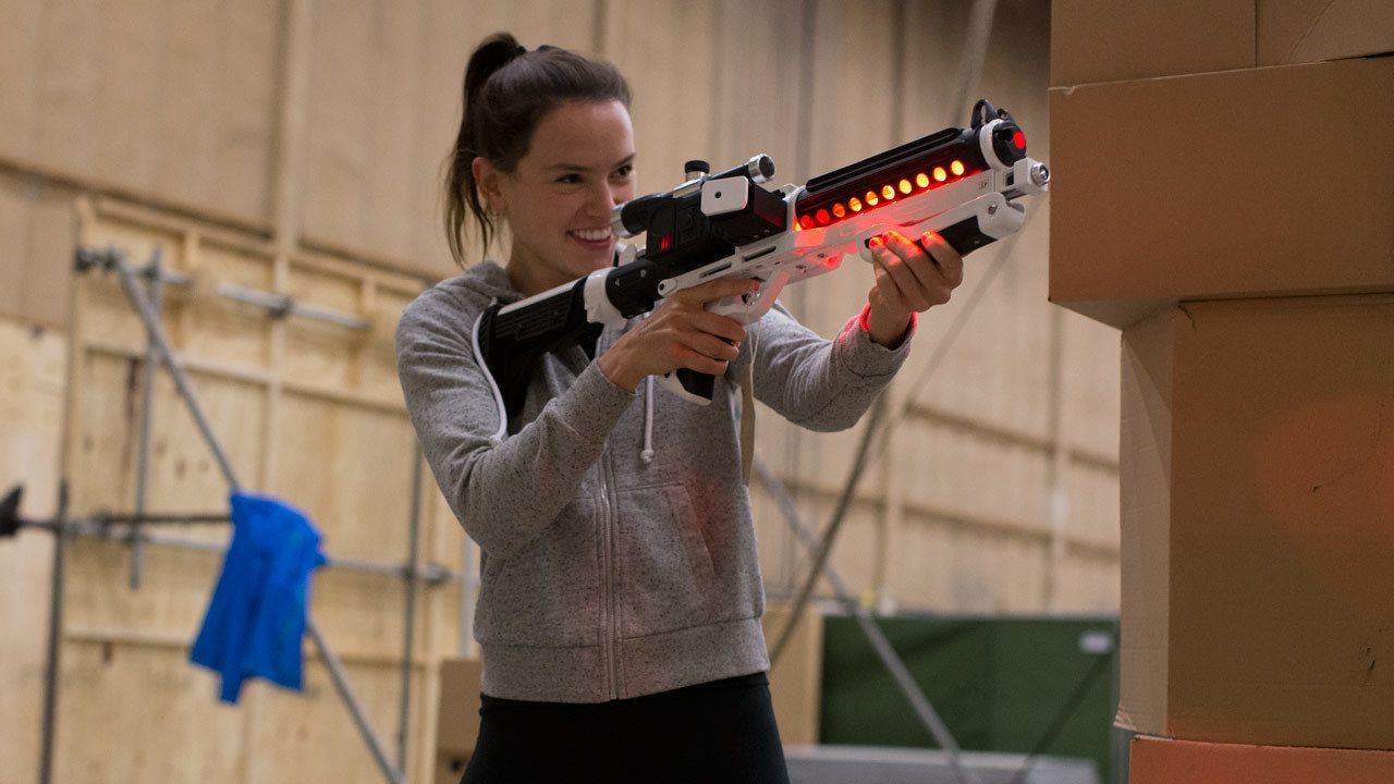Daisy Ridley training with an Airsoft gun modified as a blaster