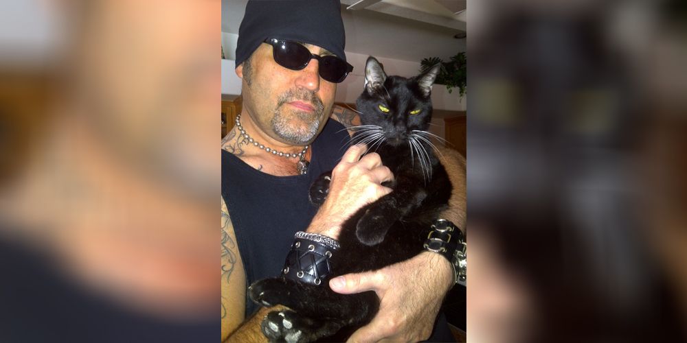 Danny Count Koker from Counting Cars and his cat friend