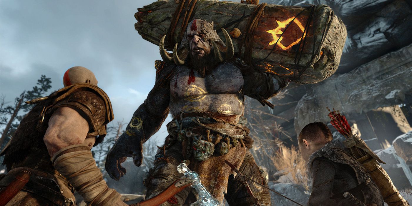 Kratos y Atreus mirando a un ogro en God of War