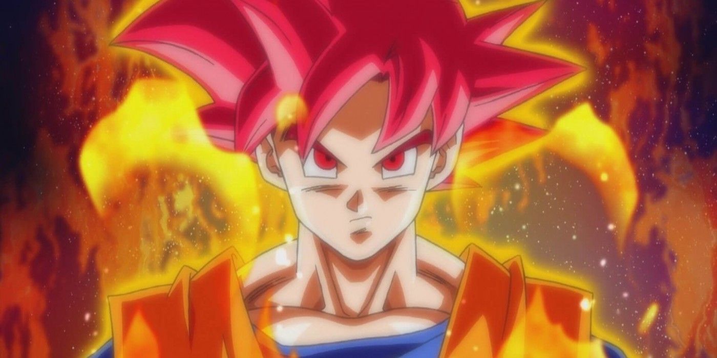 Fire burns around Goku as his hair and eyes turn red while he goes Super Saiyan God.