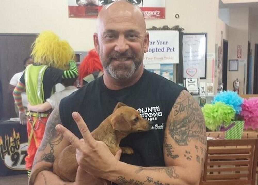 Kevin Mack from Counting Cars with a dog friend