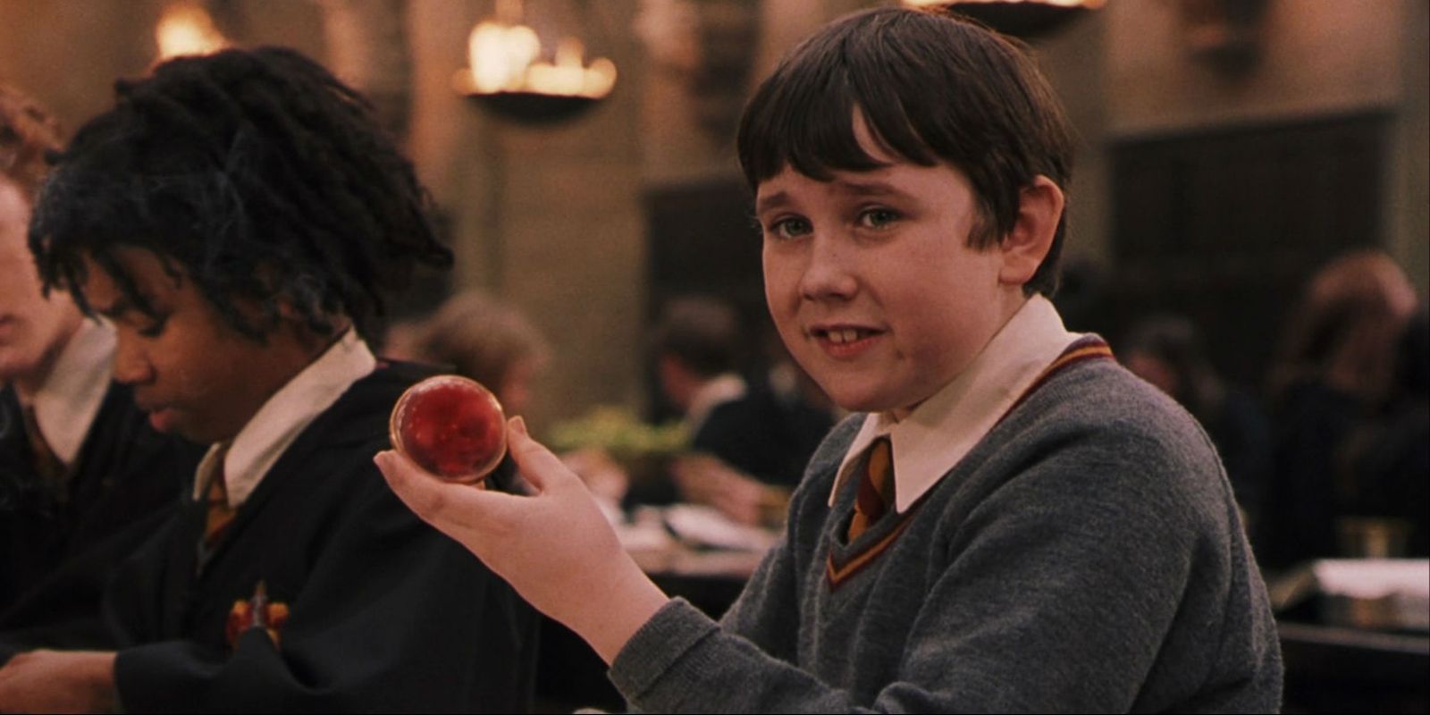 Nveille holding a rememberall in Harry Potter and the Sorcerer's Stone.