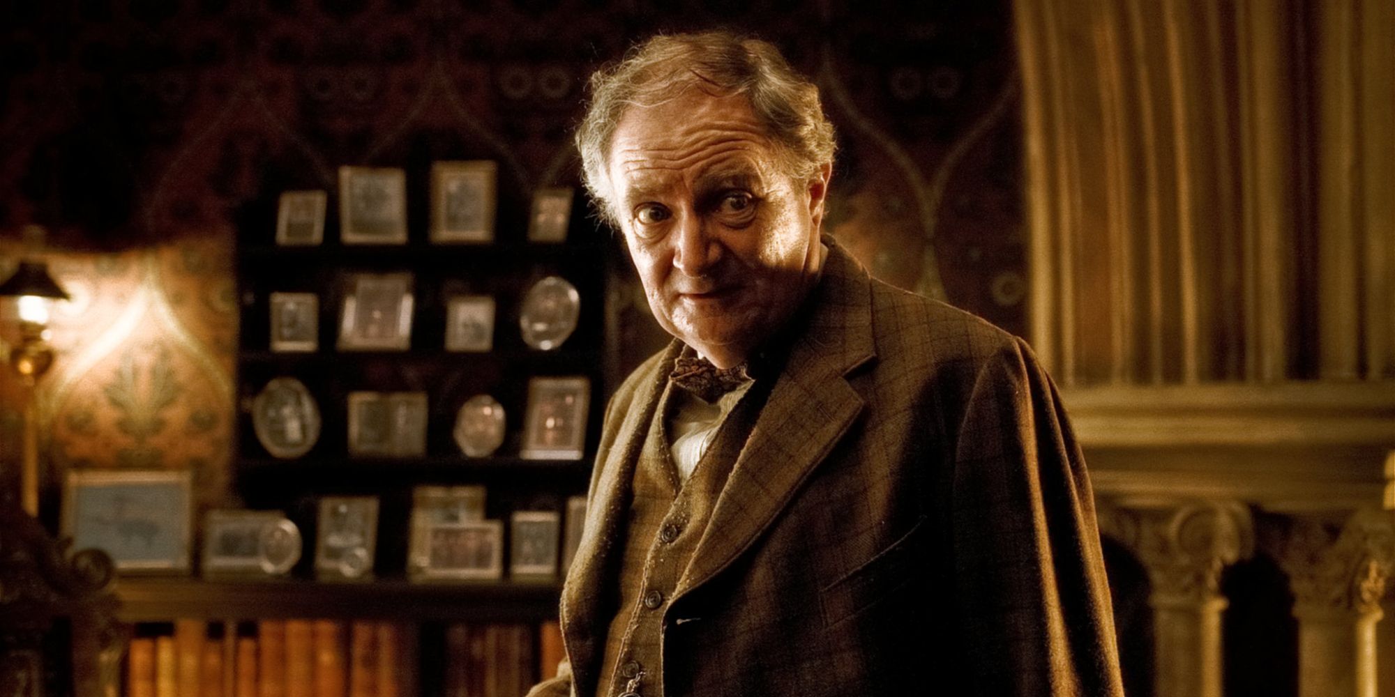 Professor Slughorn smiling in Harry Potter and the Half-Blood Prince.
