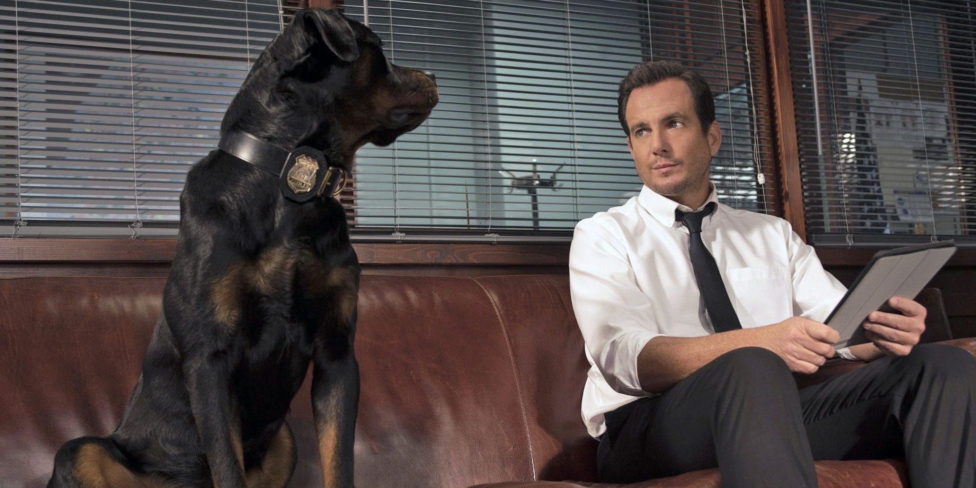 Will Arnett sitting and looking at a dog in Show Dogs 