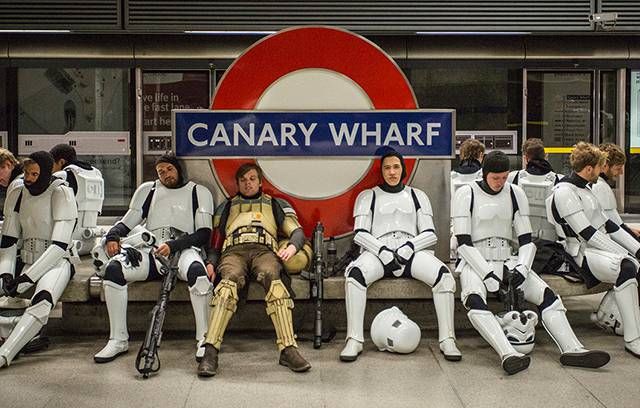 Storm troopers relax between Rogue One takes at the Canary Wharf tube station used for the Imperial Base