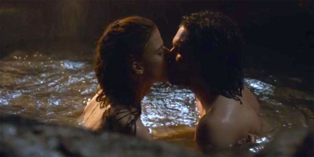 Kit Harington and Rose Leslie as Jon Snow and Ygritte in the cave in Game of Thrones