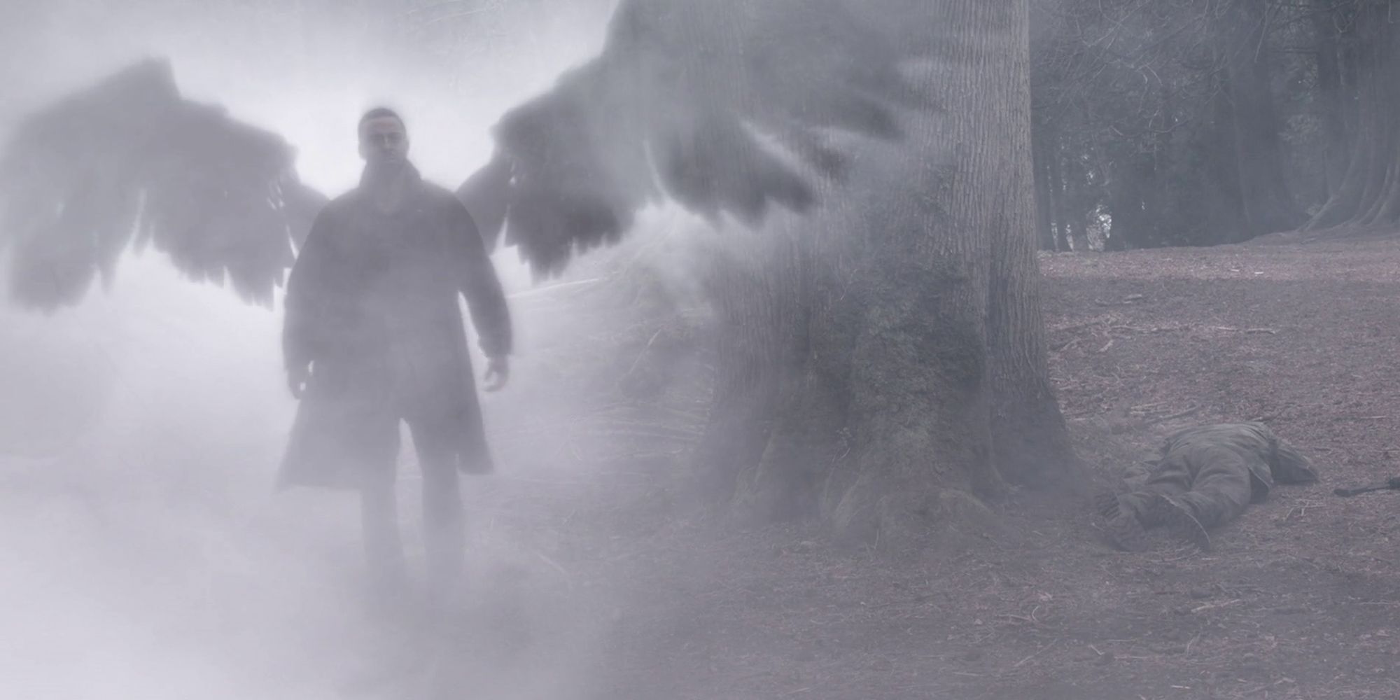 Michael walking out of the mist, wings spread 