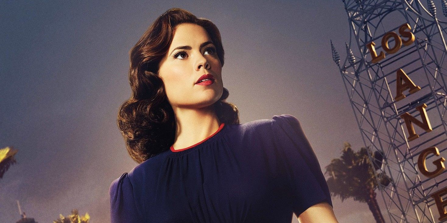 Hayley Atwell appears as Agent Carter in a blue dress against the backdrop of a sky for a Season 2 poster.