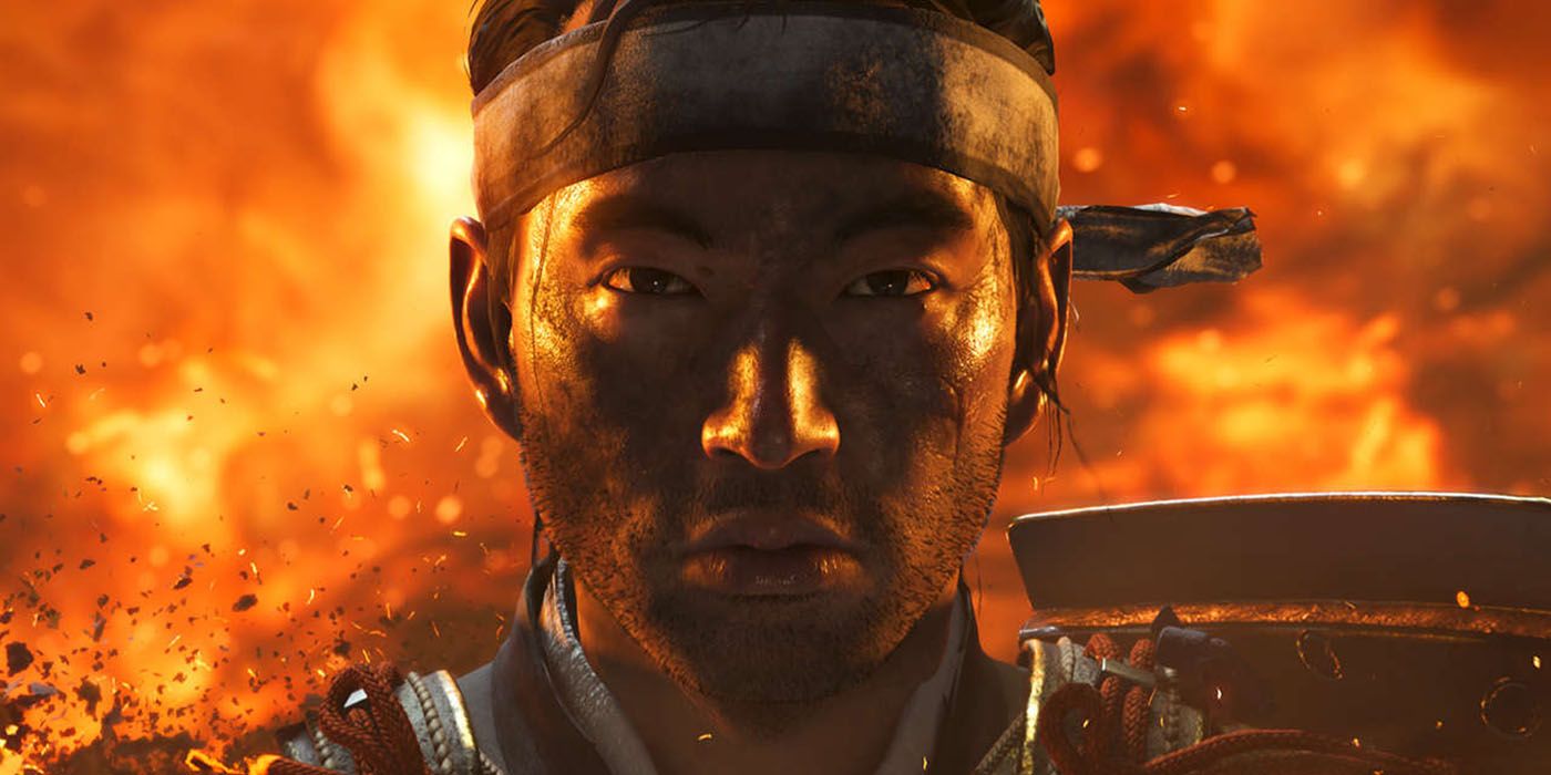 Jin standing in front of fire in Ghost of Tsushima.