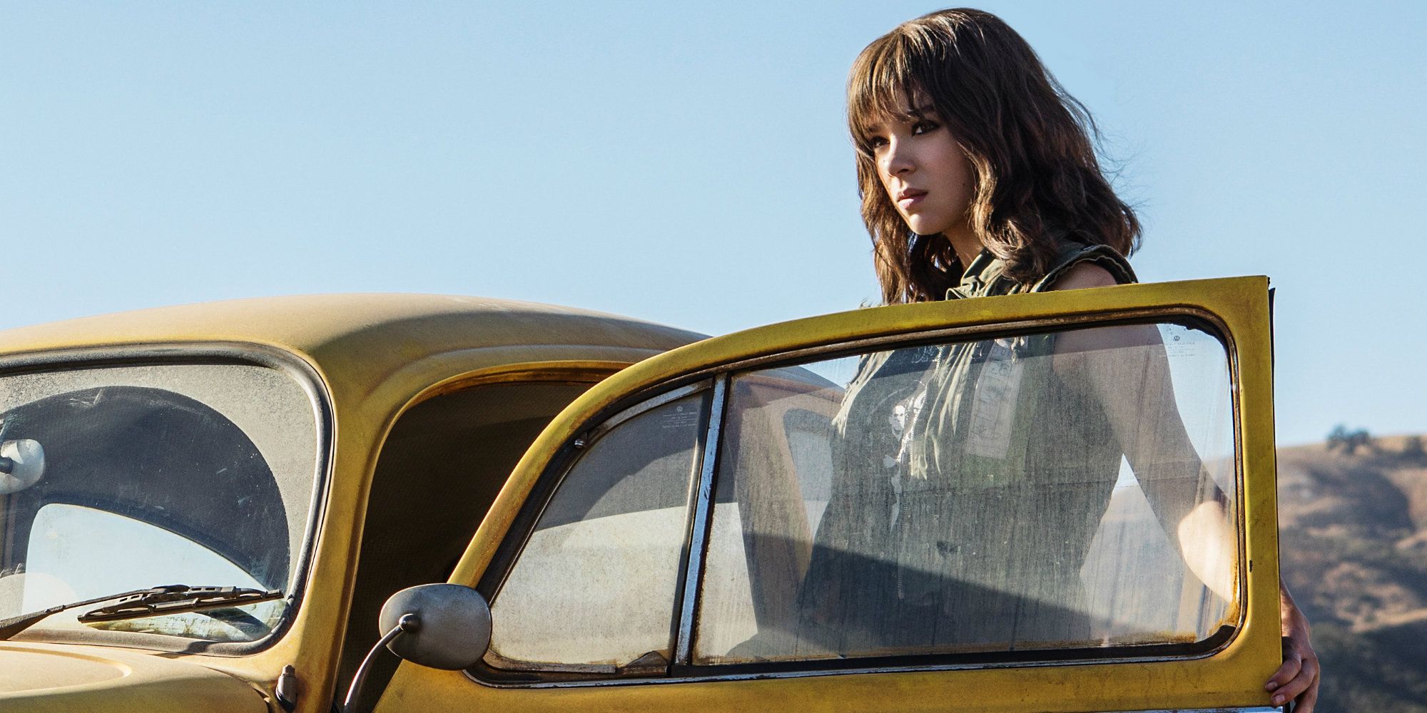Charlie about to get into her car in the Bumblebee movie.