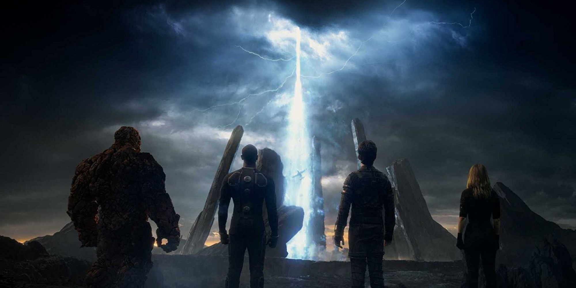 The Fantastic Four look up to a beam of light heading into the sky