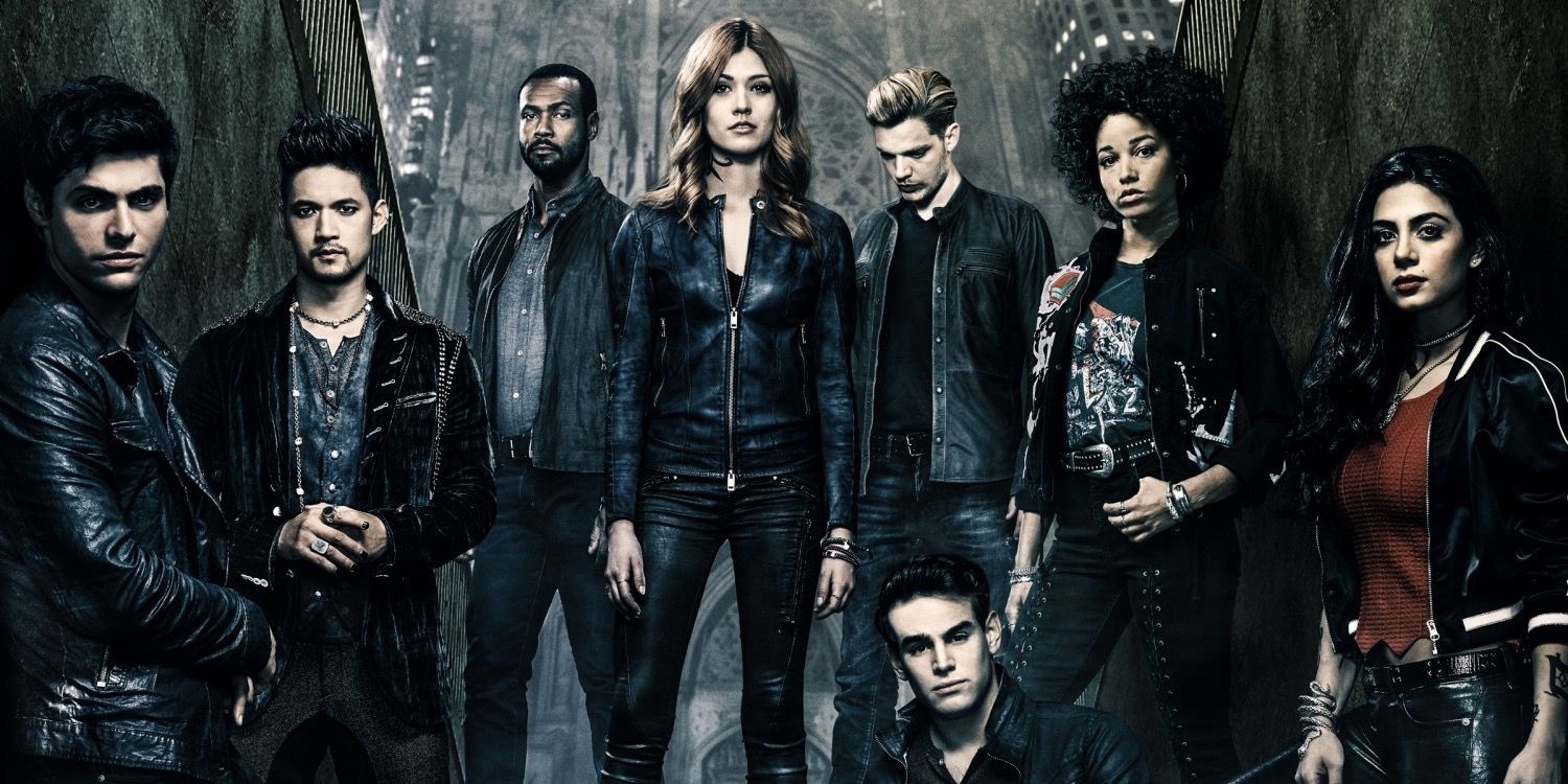 The characters of Shadowhunters in season 3 from left to right: Alec, Magnus, Luke, Clary, Jace, Simon, Maya, and Isabelle