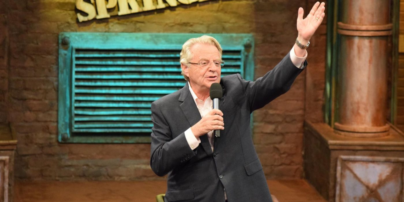 The Jerry Springer Show host Jerry Springer with his arm in the air