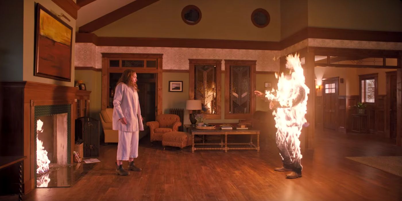 Toni Collette looking at someone on fire in Hereditary.
