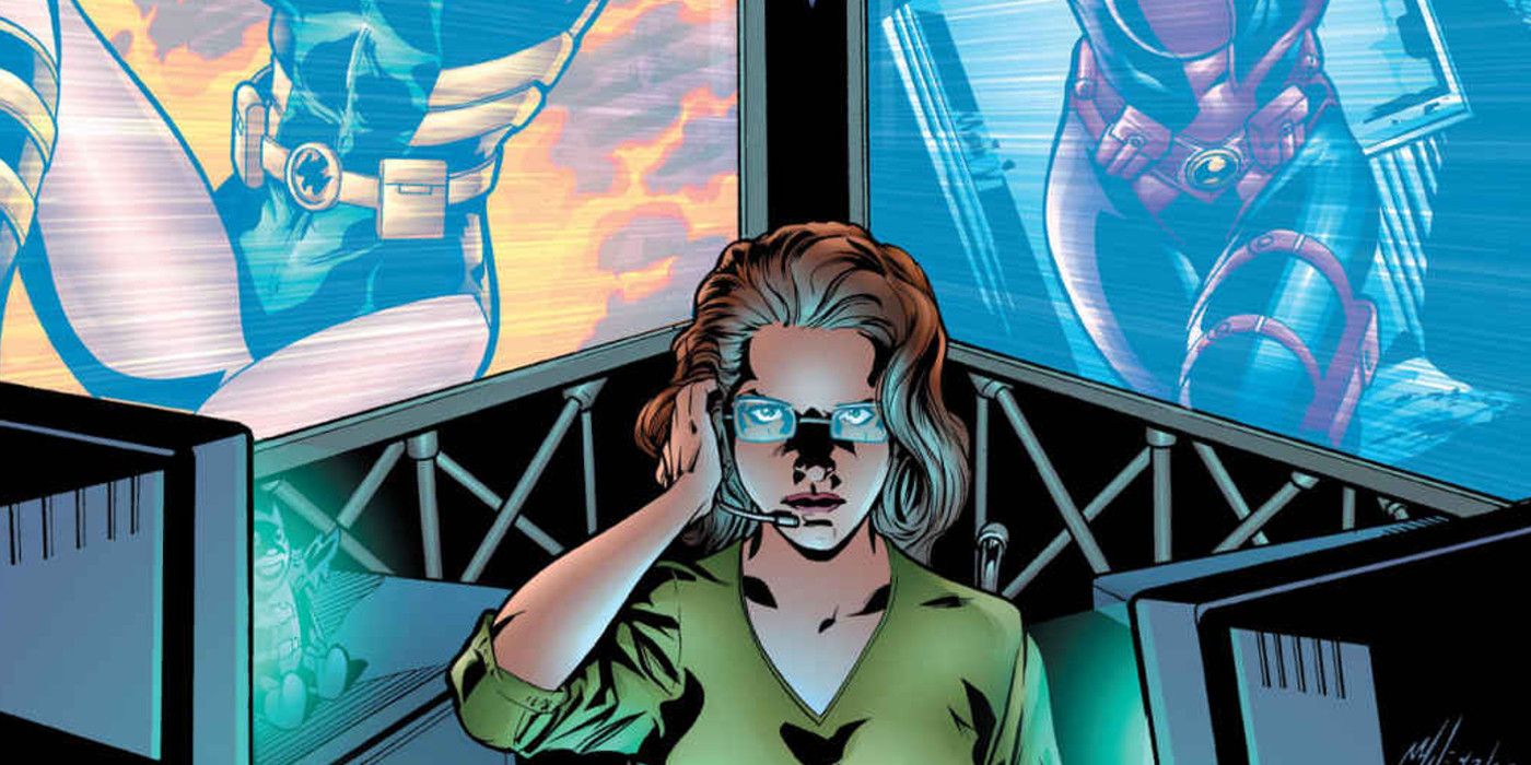 Barbara Gordon Oracle in front of her computers in DC Comics 