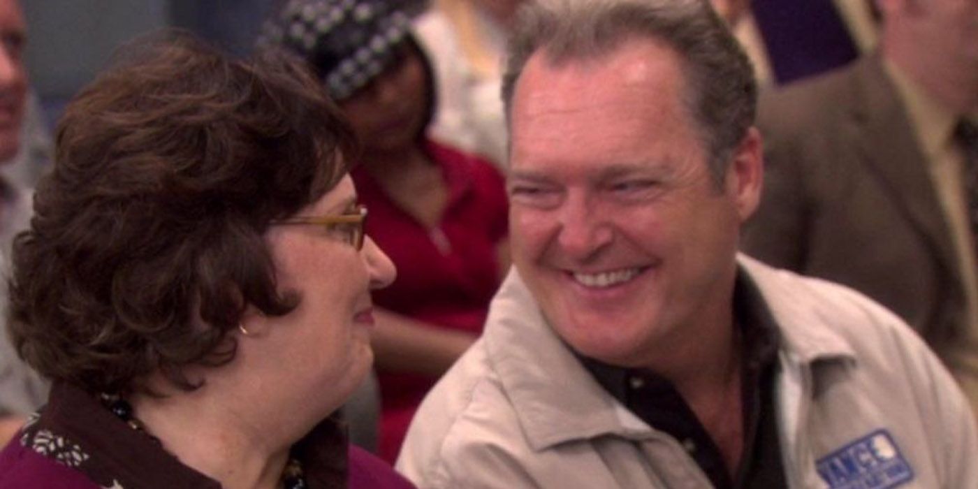 Bob Vance and Phyllis from The Office looking at each other and smiling.