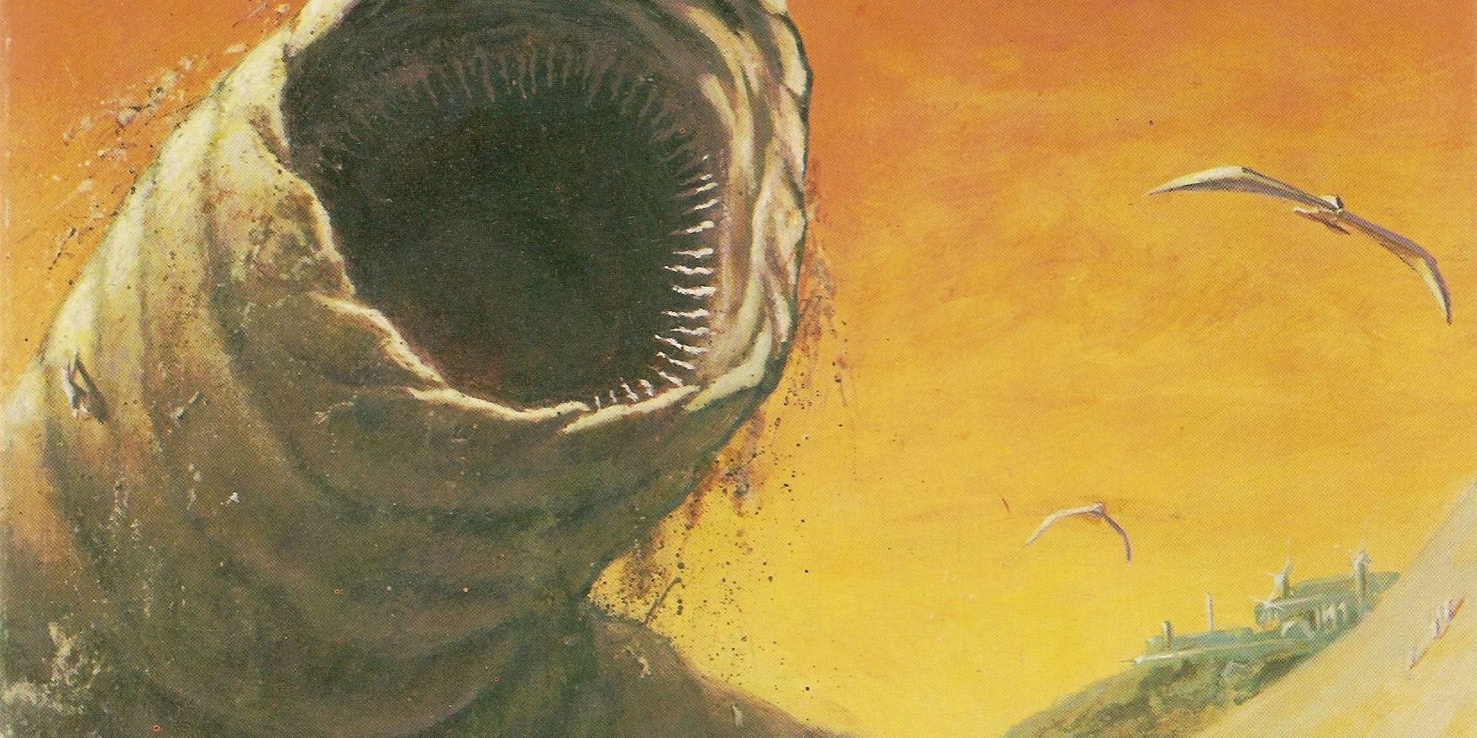 A sandworm emerging from the dust on the cover of Dune novel.