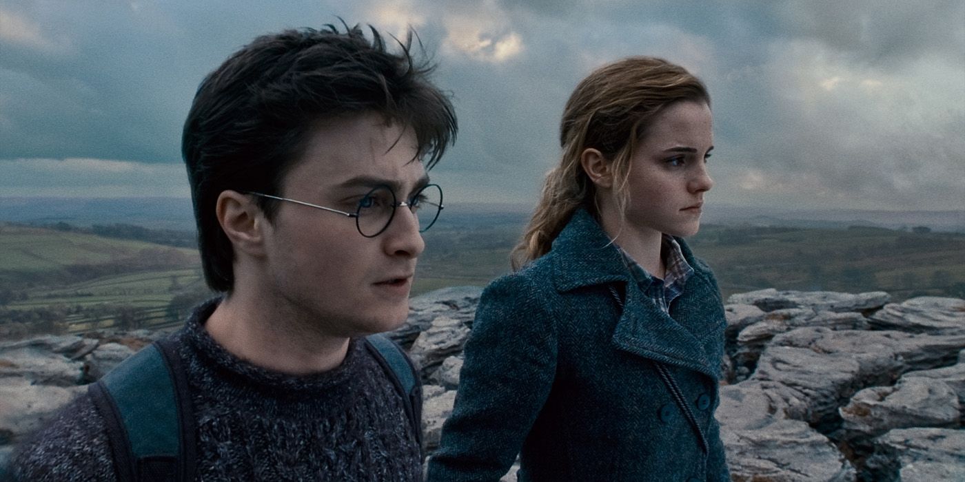 Harry and Hermione atop a cliff in Deathyl Hallows Part 1
