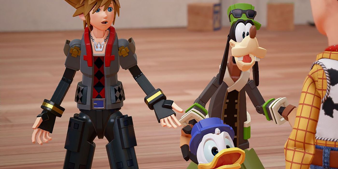 Sora, Goofy, and Donald talk to Woody from Kingdom Hearts III