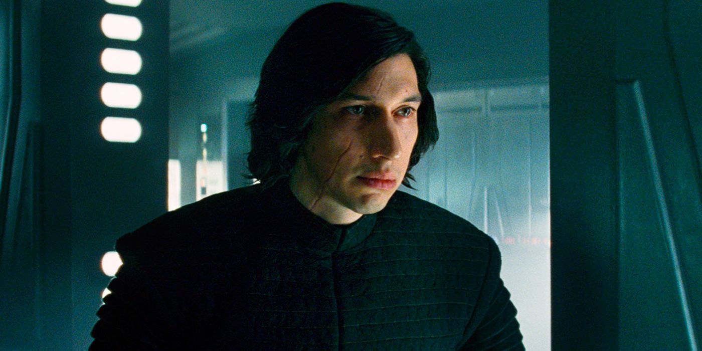 Kylo Ren unmasked and looking on.