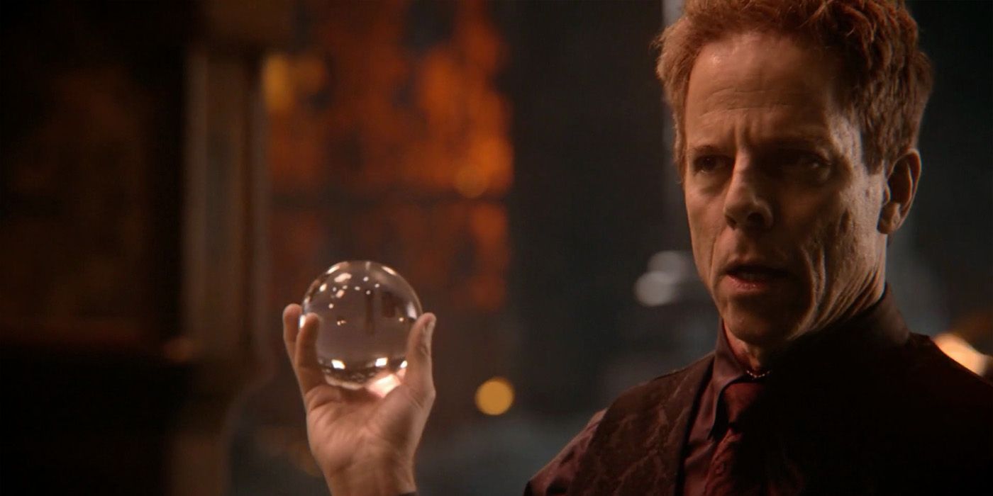 Hades (Greg Germann) blackmails Rumplestilskin in season 5 of Once Upon A Time