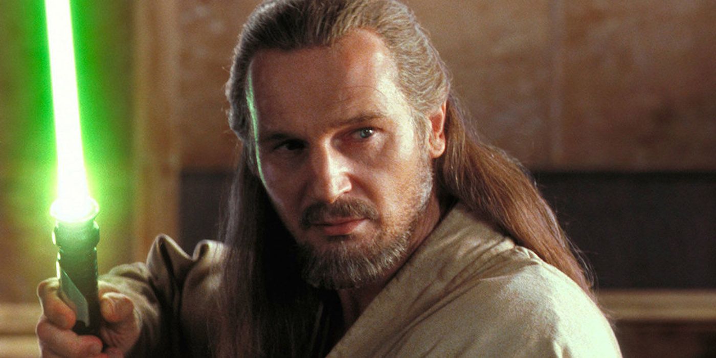 Qui Gon Jinn with a lightsaber in The Phantom Meance.