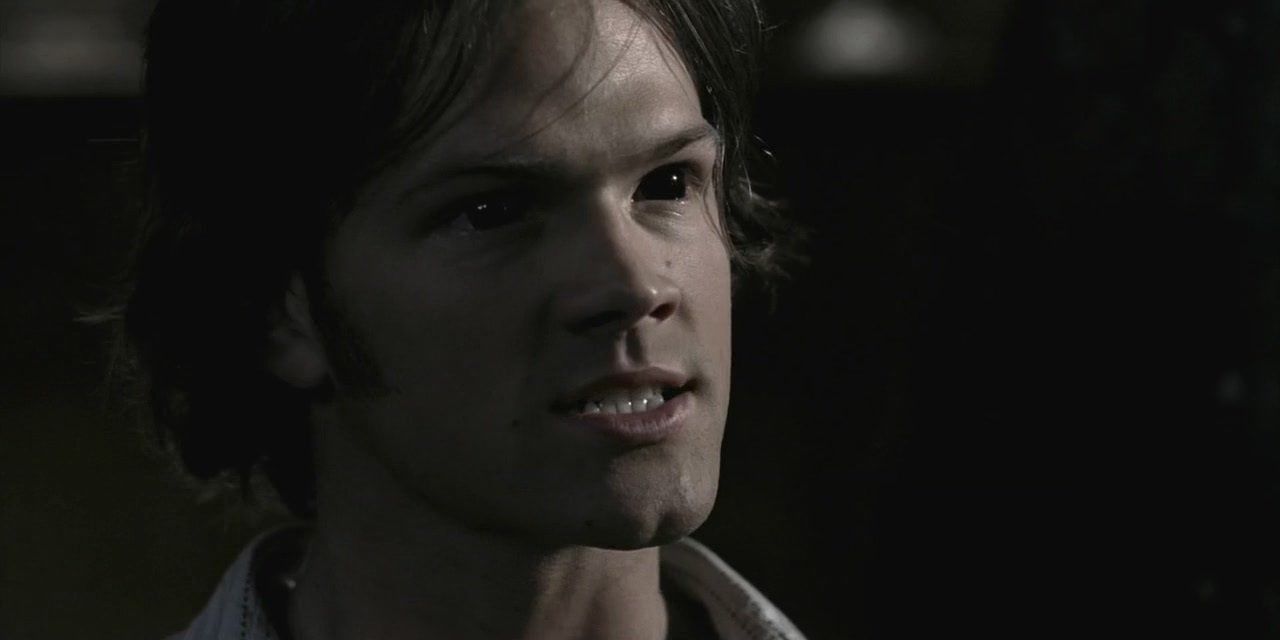 Sam with demonic, black eyes in Supernatural.