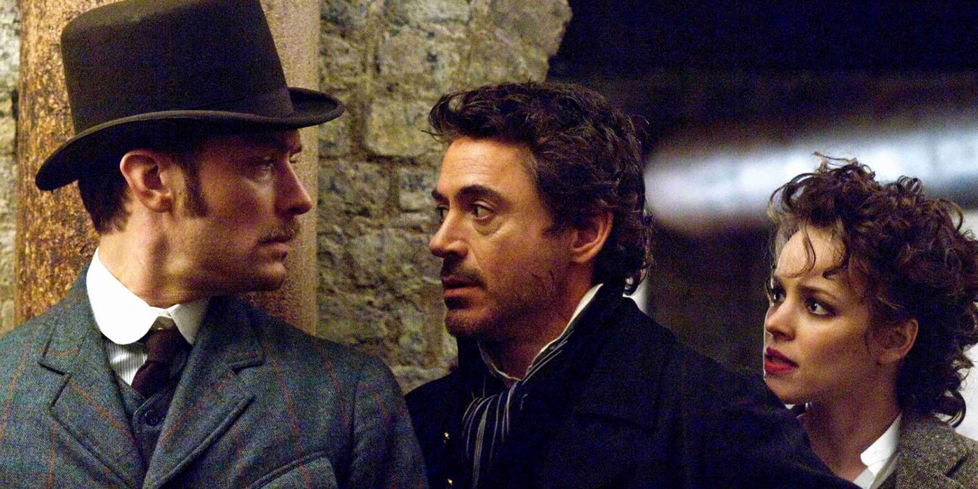 Jude Law, Robert Downey Jr. and Rachel McAdams Standing Together in Sherlock Holmes