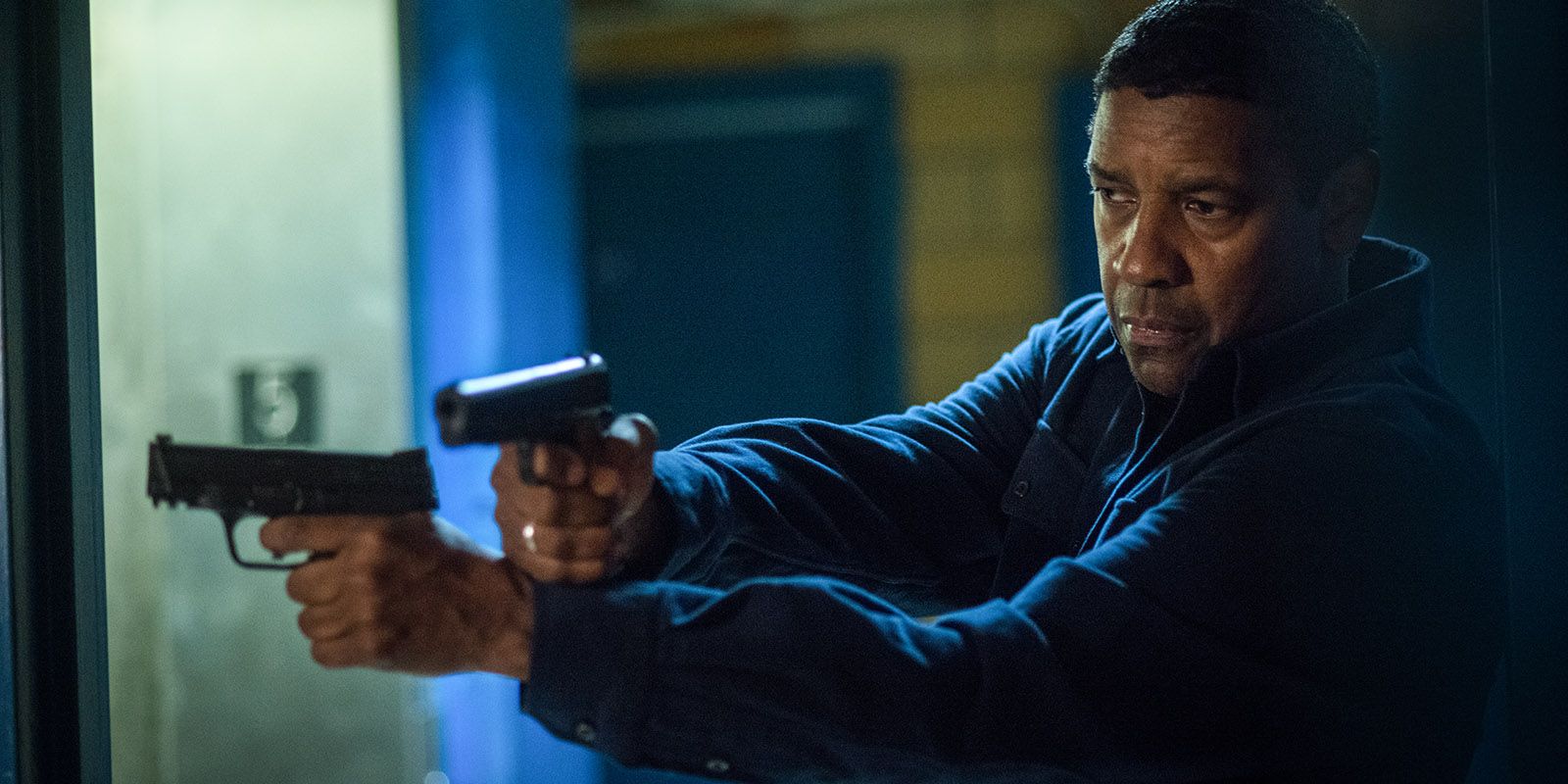 Denzel Washington wielding dual pistols in The Equalizer 2