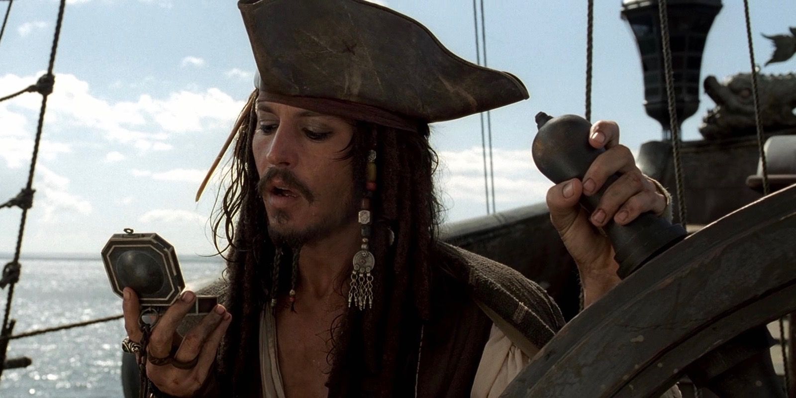 Jack Sparrow looks at his compass