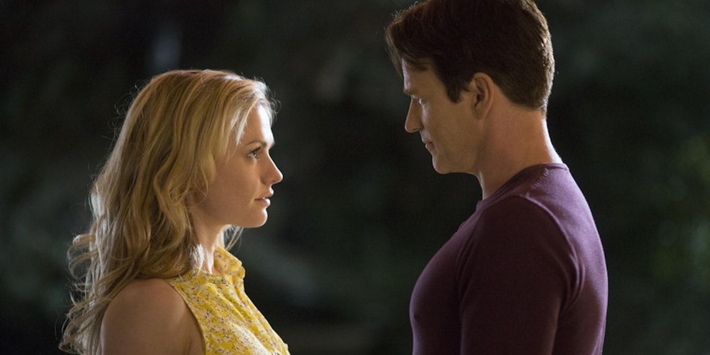 A man and woman look at one another in True Blood 