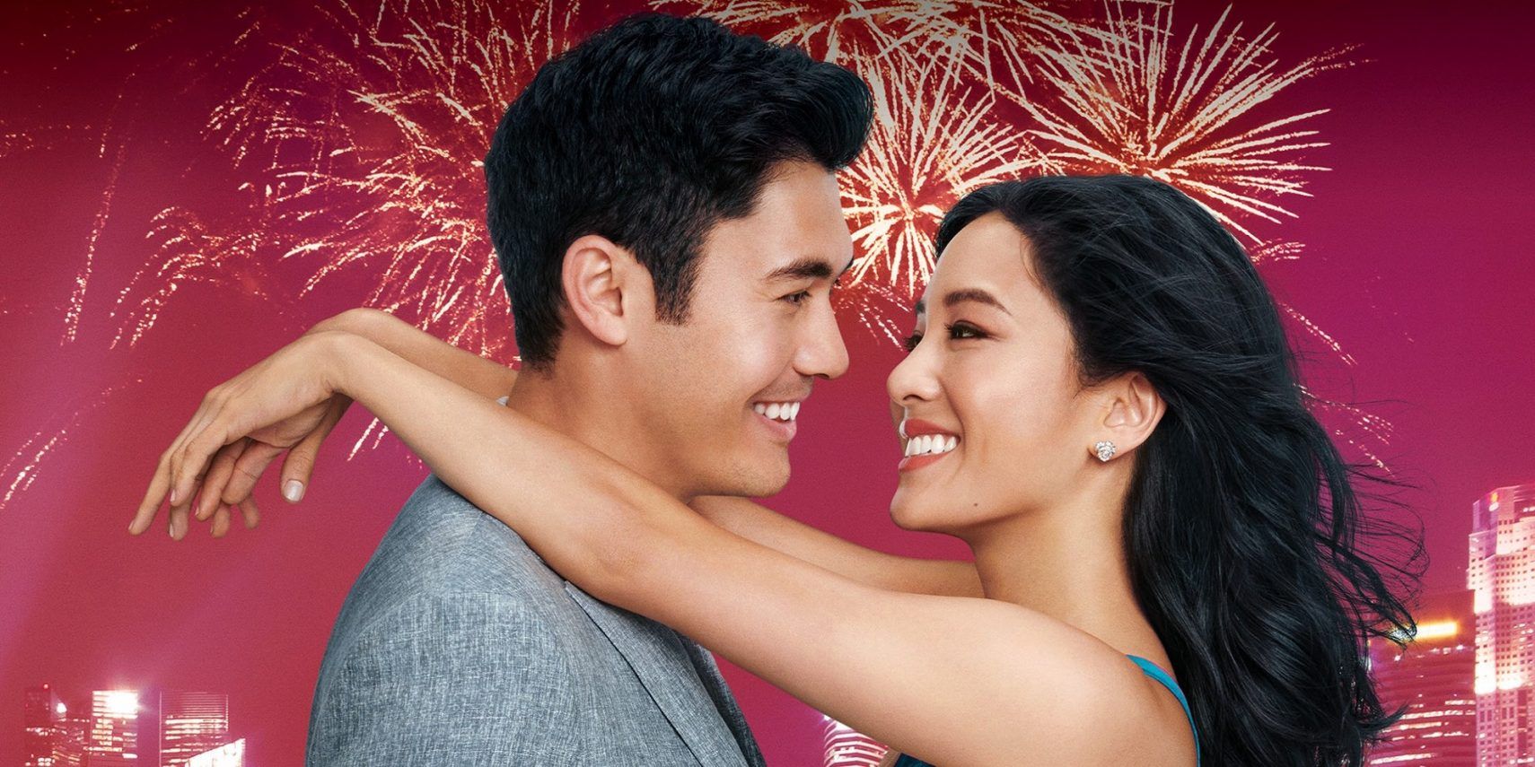 Henry Golding and Constance Wu smiling on the poster for Crazy Rich Asians.