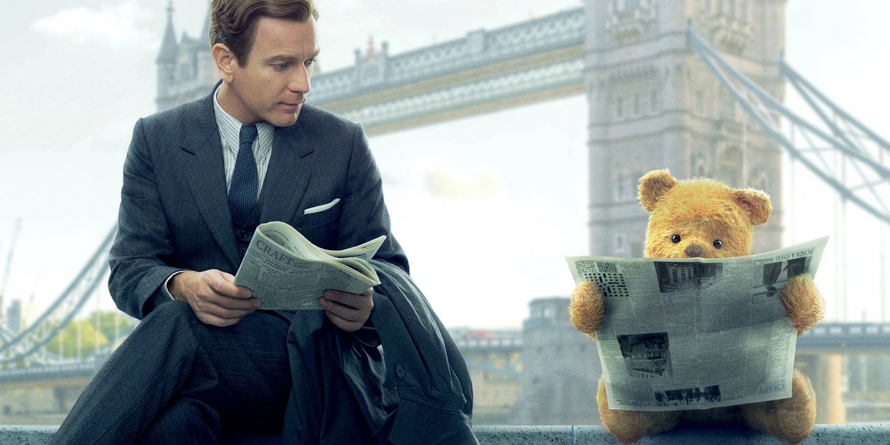 Christopher Robin and Winnie the Pooh read the newspaper