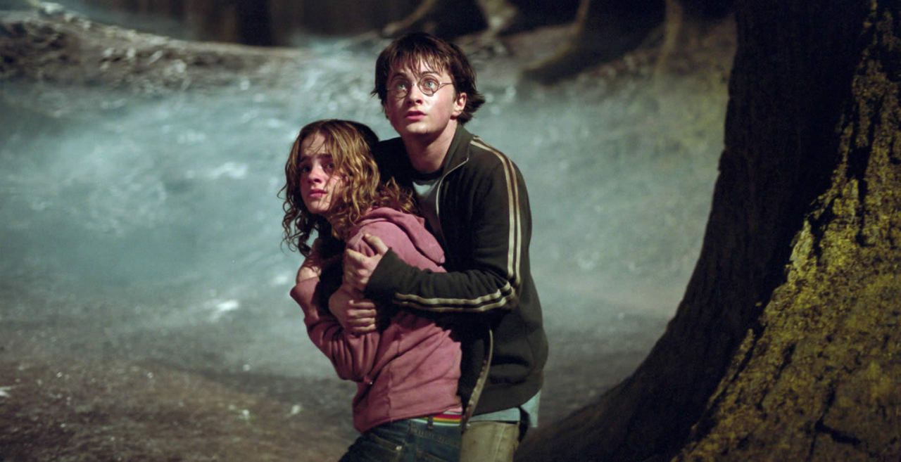 Harry holds Hermione as the werewolf closes in in The Prisoner Of Azkaban