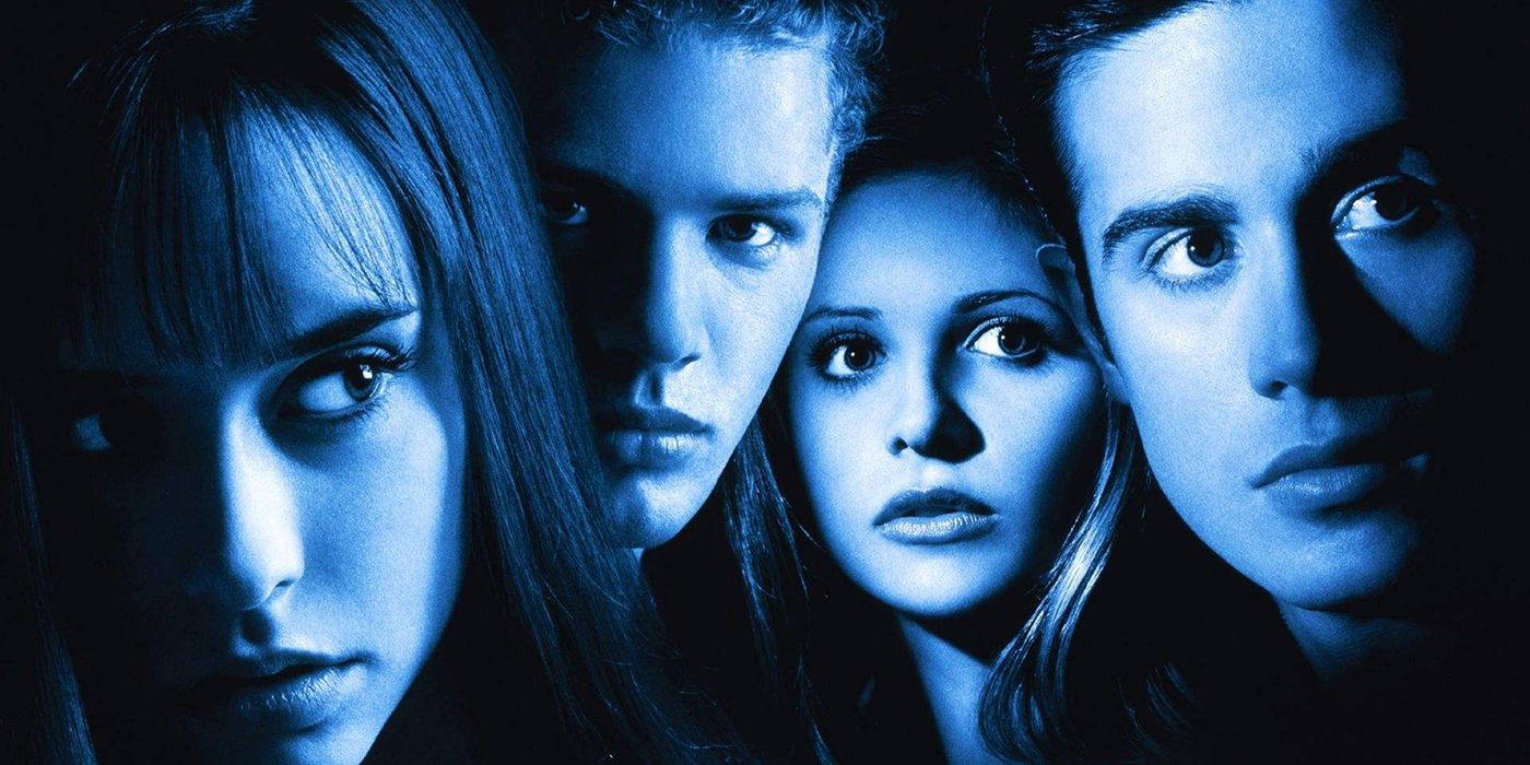 The cast of I Know What You Did Last Summer look on in a promotional image