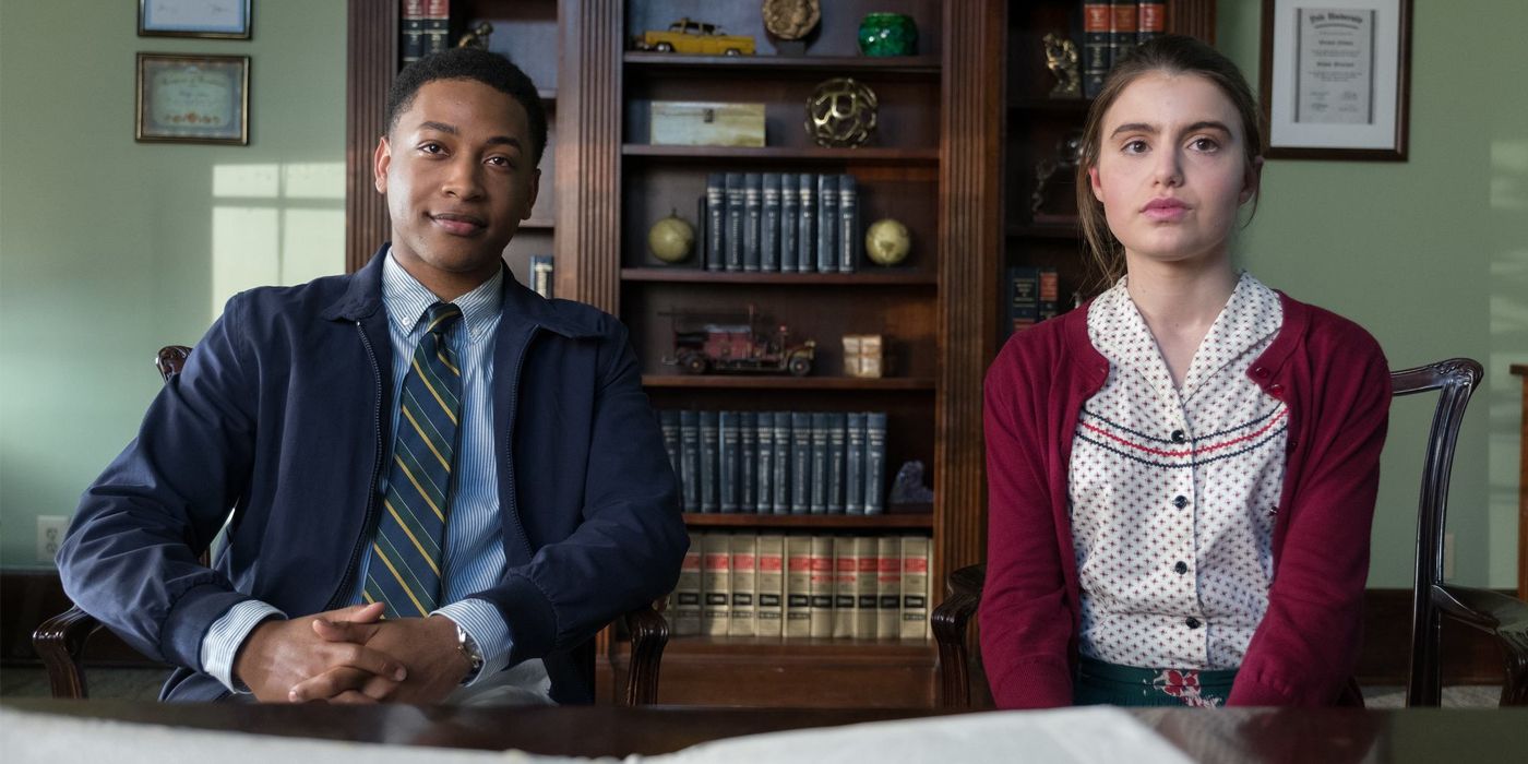 Jacob Latimore and Sami Gayle sitting in an office in Candy Jar.