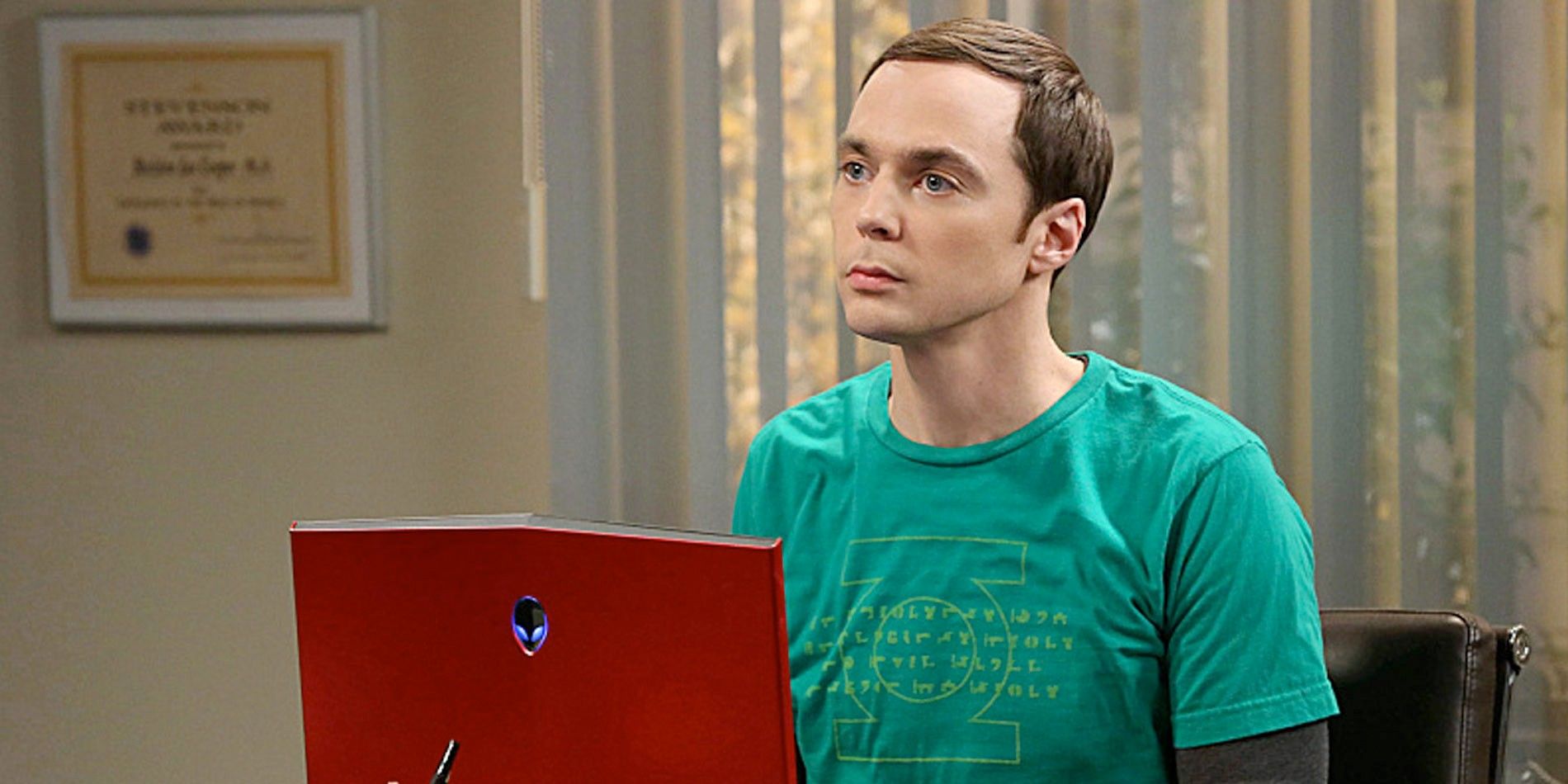 Sheldon Cooper sitting in front of his laptop and looking up in The Big Bang Theory