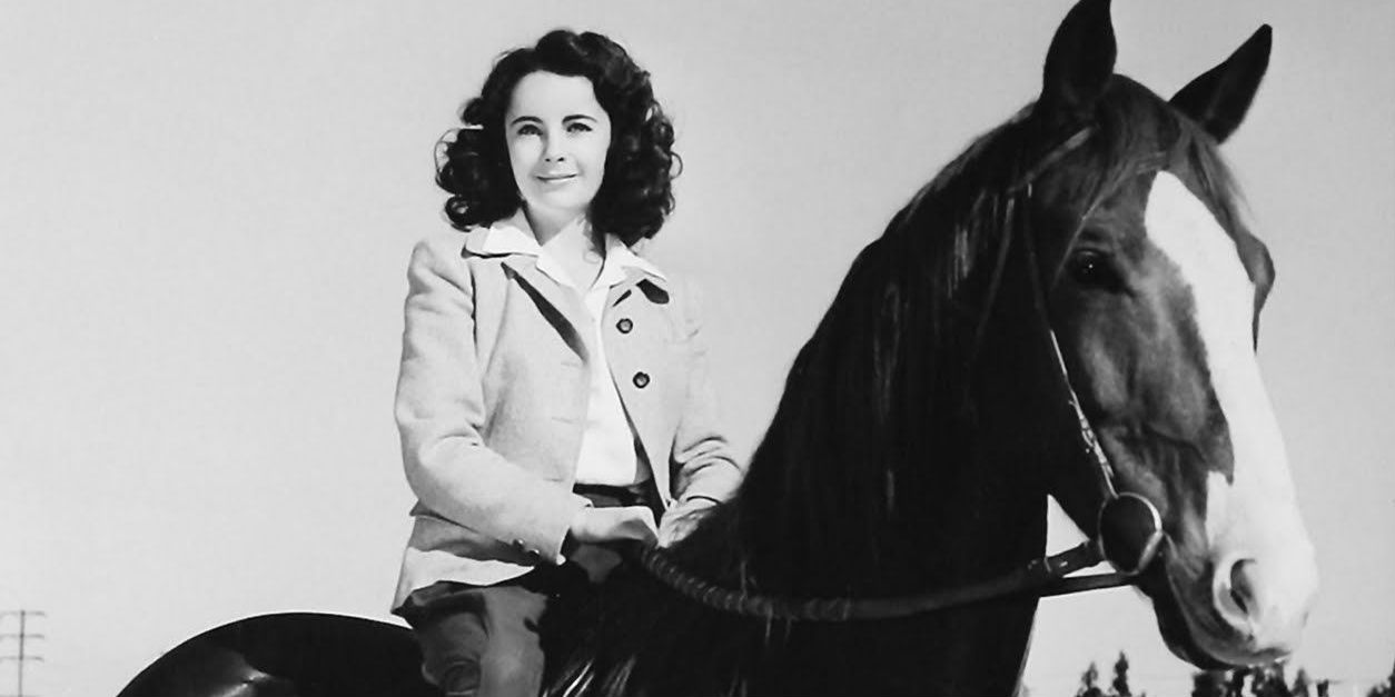 Elizabeth Taylor rides a horse in National Velvet