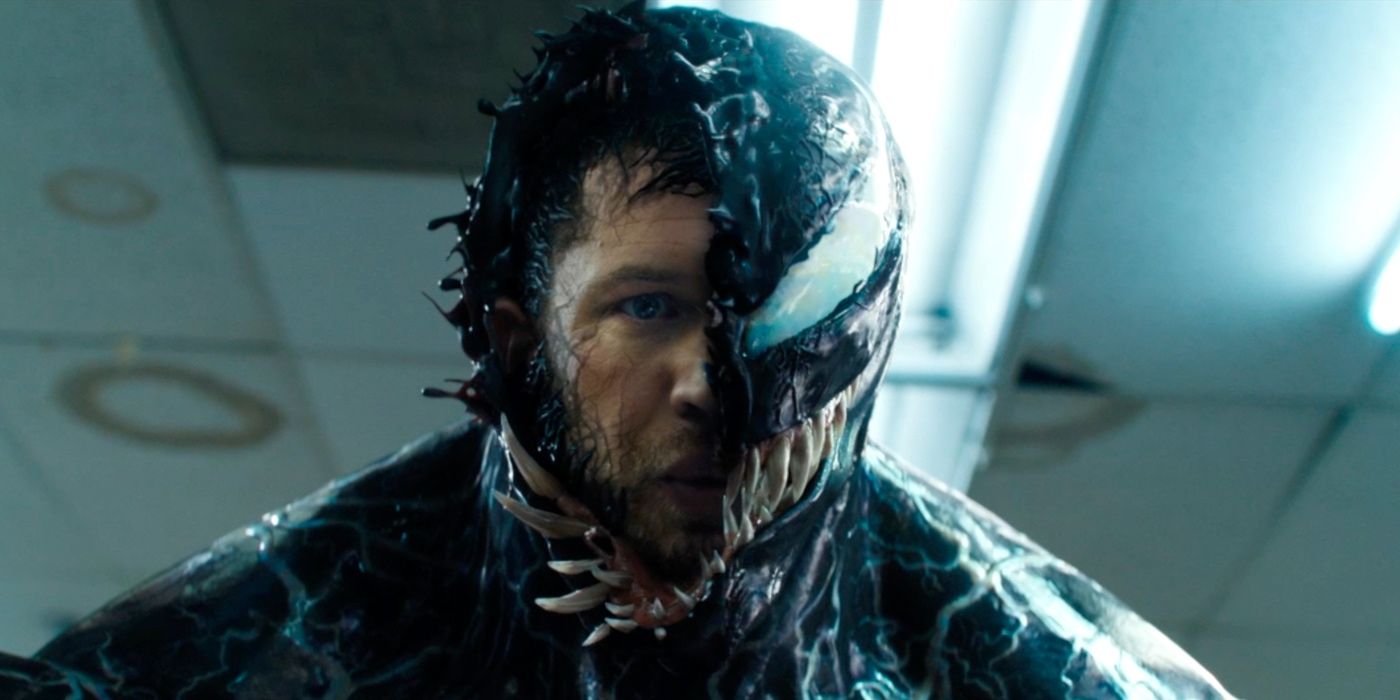 Eddie Brock peers out from within the Venom symbiote in Venom.