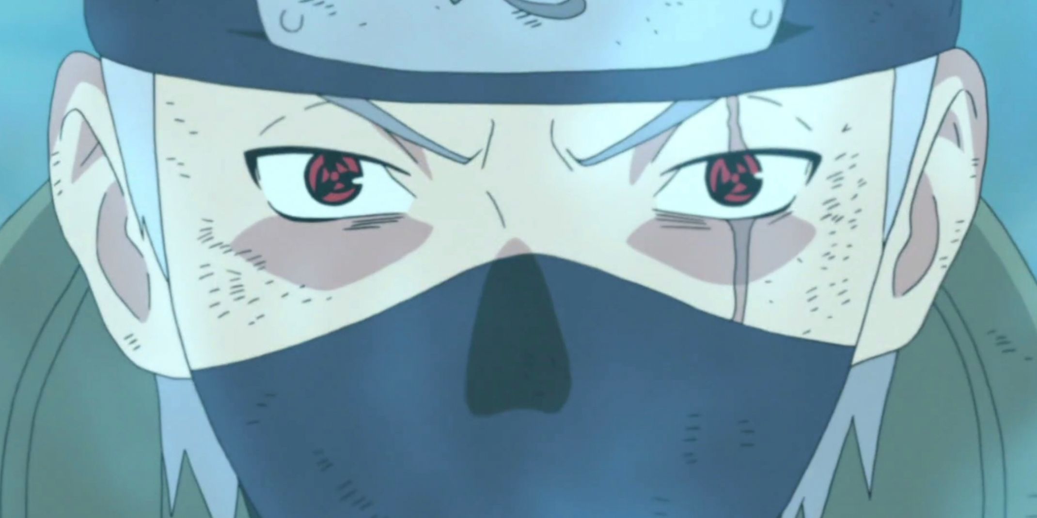 Tampilan dekat Kakashi dengan Mangekyo Sharingan di kedua matanya di Naruto