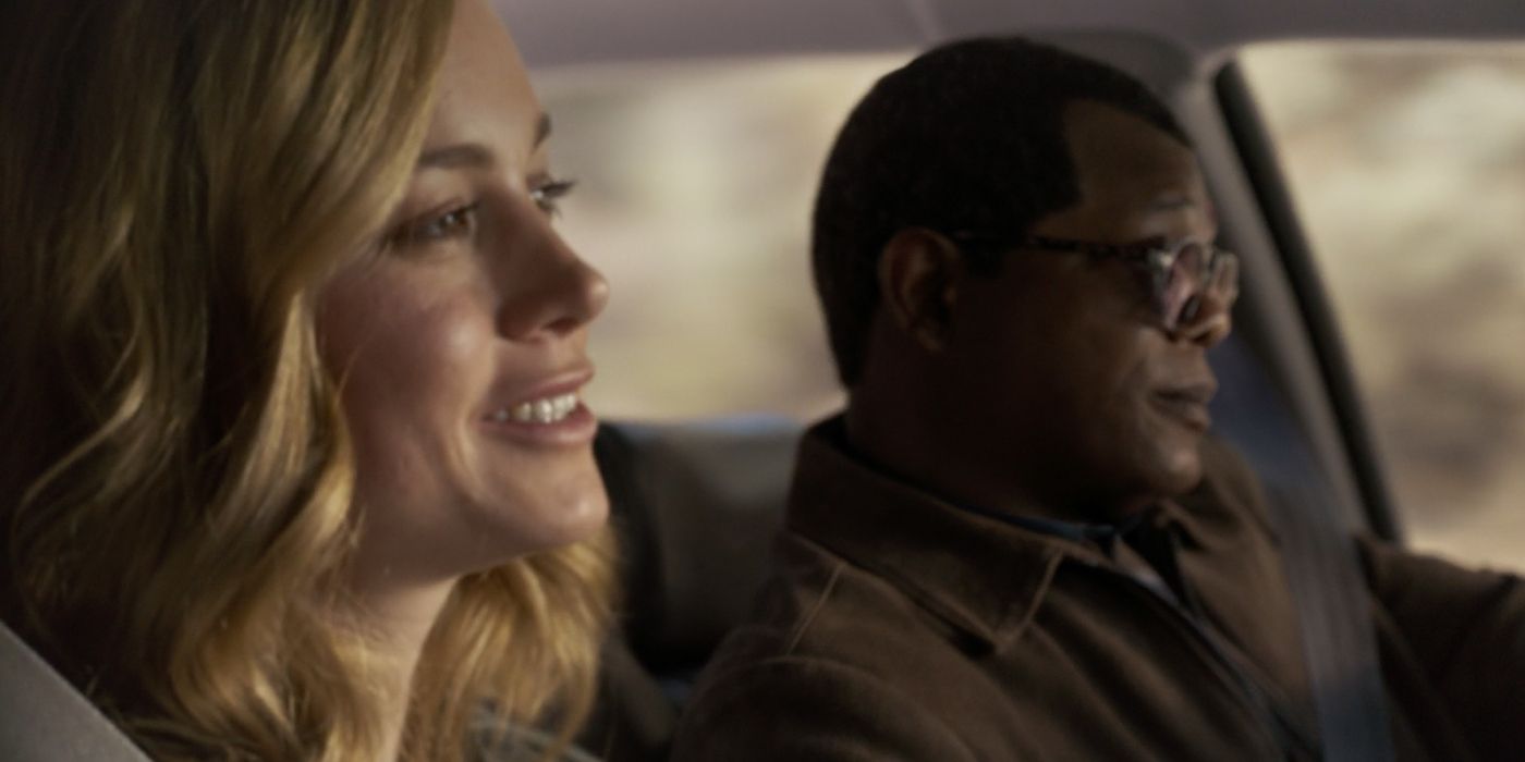 Brie Larson and Samuel L Jackson driving in Captain Marvel