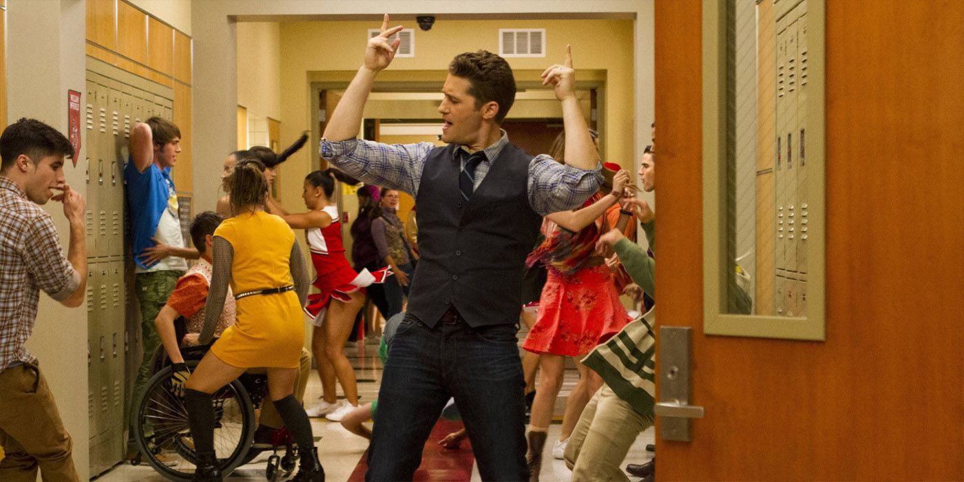Will and students twerk in a hallway in Glee