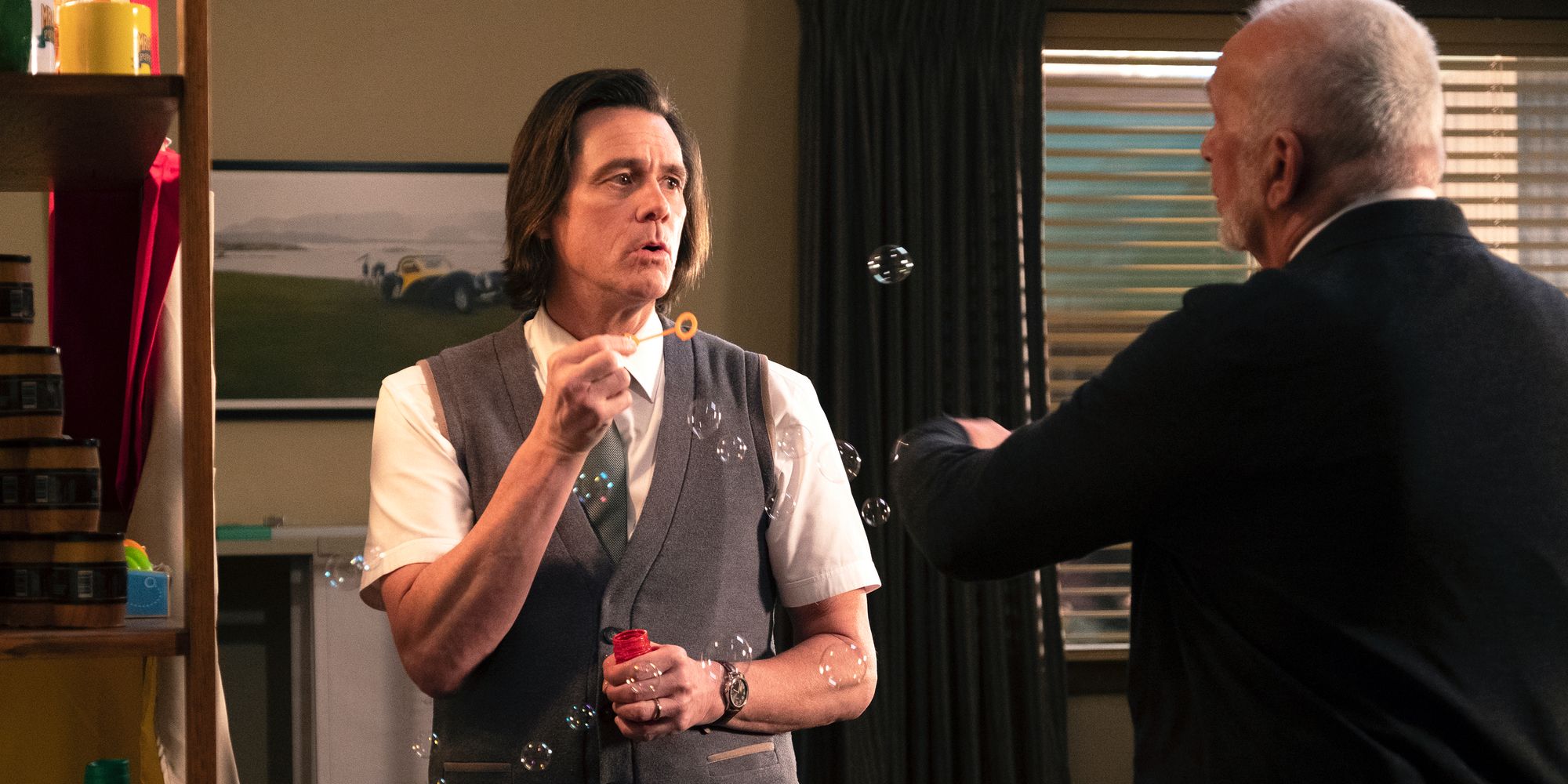 Jim Carrey blows Bubbles at Frank Langella at joke
