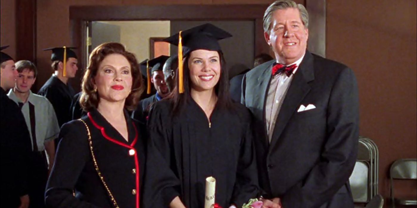 Lorelai smiling with Richard and Emily at her graduation on Gilmore Girls