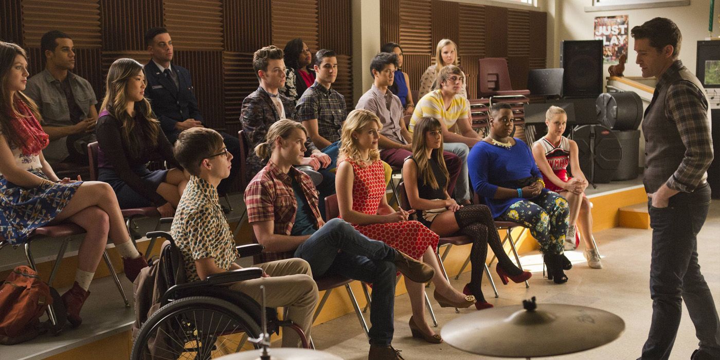 New Directions, past and present, at the choir room on Glee