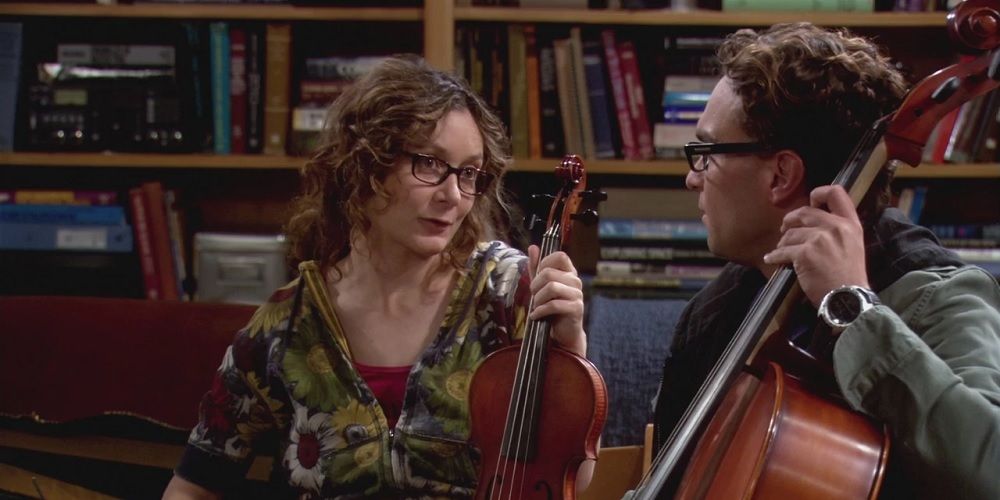 Leslie Winkle playing the violin with Leonard on The Big Bang Theory