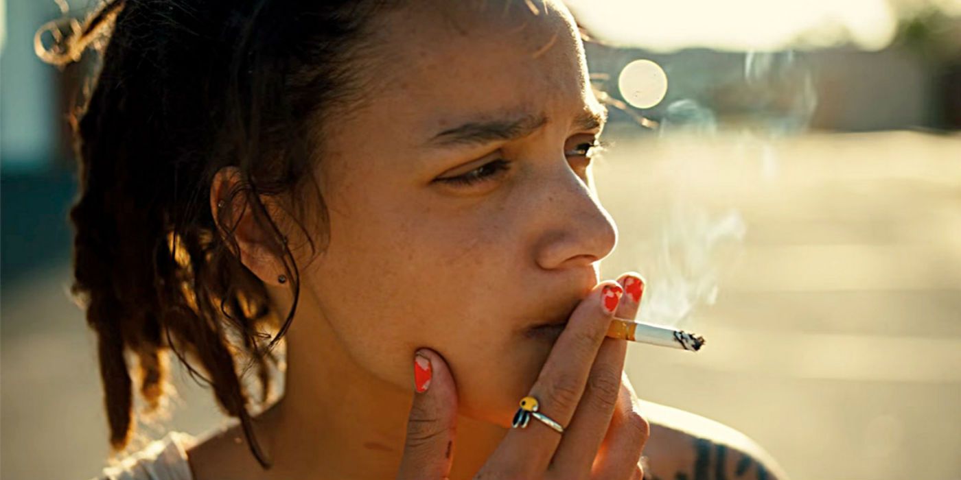 Sasha Lane smoking a cigarette in American Honey