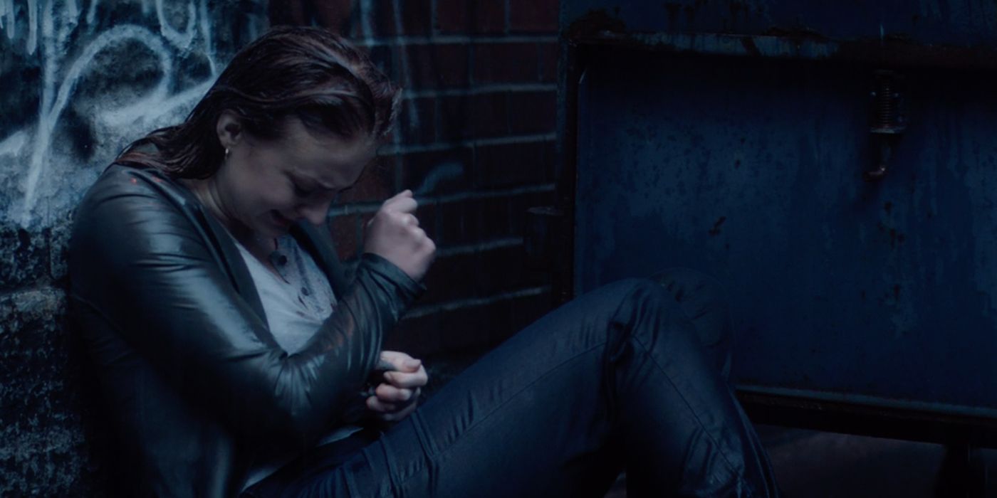 Sophie Turner as Jean Grey crying outside in X-Men Dark Phoenix