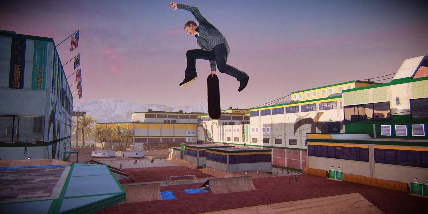 Tony Hawk pulls a grab trick in the air in Pro Skater 5.